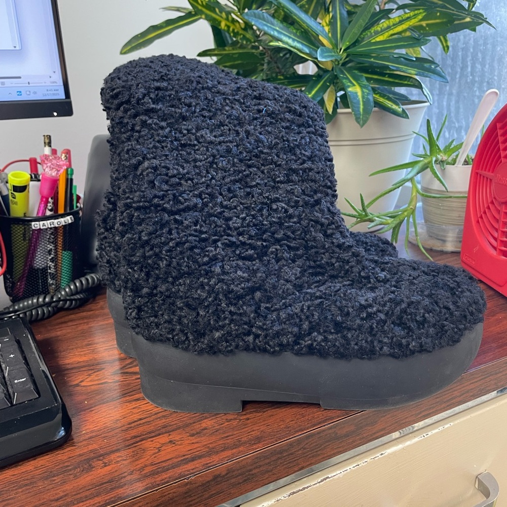 Statement piece knee boots that are warm